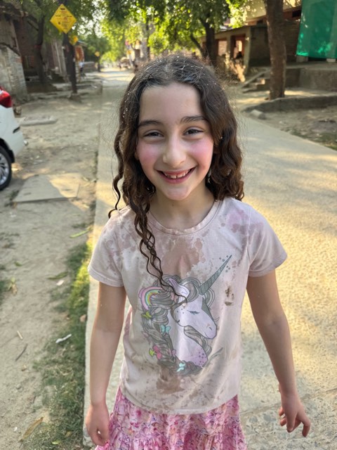 Eve on a busy street in India