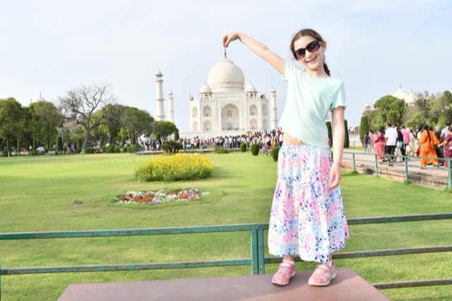 The white marble dome and minarets of the Taj Mahal