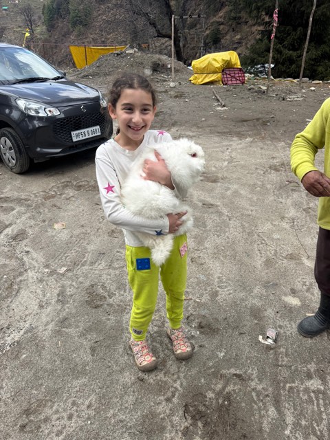 Eve with a very large rabbit